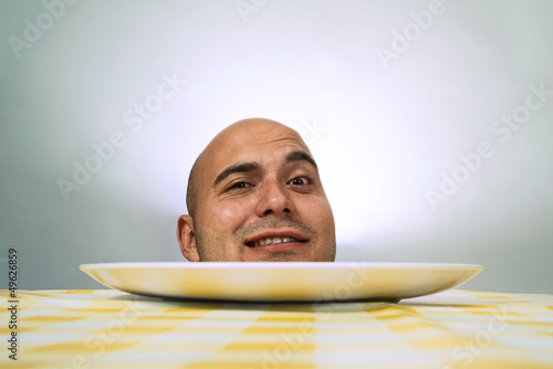 Photo: Human head on plate Human head on plate