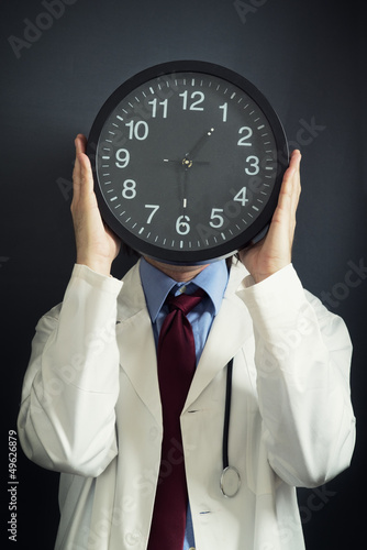 Photo: Doctor is working overtime Doctor is working overtime