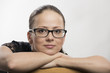 Portrait of the young woman in glasses