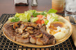 Steak with salad and mashed potatoes