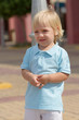Cute blond boy outdoors