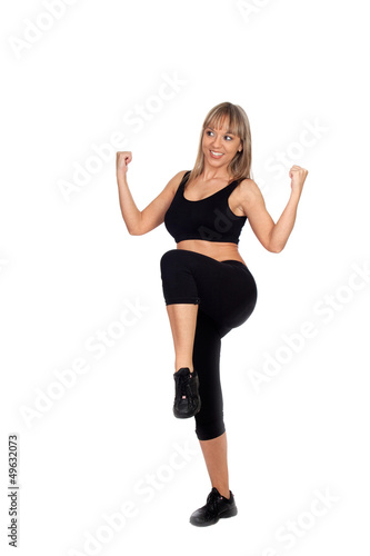 Photo: Woman in sportswear exercising Woman in sportswear exercising