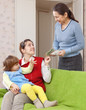 Mother pays nanny for her child