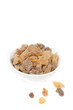 sugar candy in a white bowl isolated on a white background