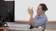 Video: Young attractive woman applying make up in the office Young attractive woman applying make up in the office