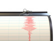 Seismograph instrument recording ground motion during earthquake
