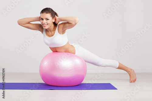 Photo: Woman on a fitness ball Woman on a fitness ball