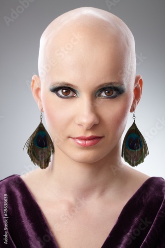 Photo: Studio portrait of hairless woman Studio portrait of hairless woman