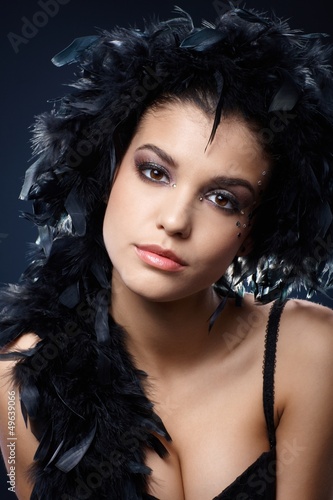 Photo: Attractive woman with black feather boa Attractive woman with black feather boa
