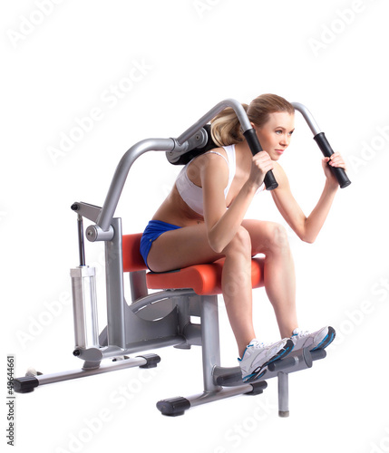 Photo: Blonde woman on isodynamic exerciser Blonde woman on isodynamic exerciser
