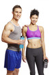 Young man and woman relaxing in sports outfits