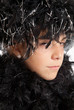 Photo: Young girl in feather boa Young girl in feather boa