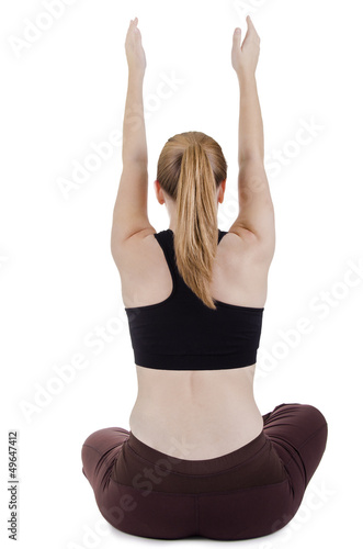 Photo: Sitting woman doing stretching Sitting woman doing stretching