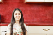 Brunette woman in kitchen