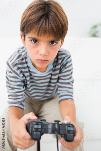 Photo: Boy playing video games Boy playing video games
