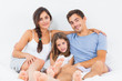 Cheerful family sitting