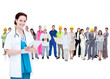 Pretty doctor standing in front of diverse career group