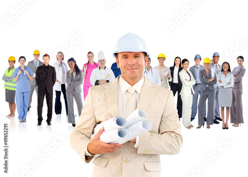Photo: Architect standing in front of diverse career group Architect standing in front of diverse career group