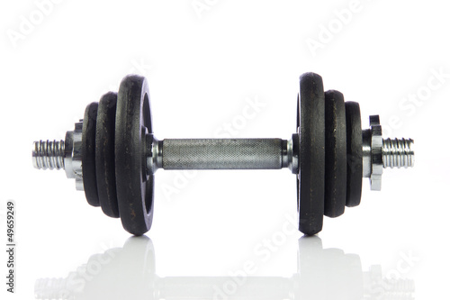 Photo: Black dumbbell isolated on a white background. Black dumbbell isolated on a white background.