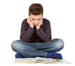 Photo: Junge / Schüler liest konzentriert ein Buch Junge / Schüler liest konzentriert ein Buch