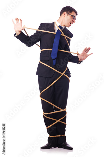 Photo: Businessman tied up with rope on white Businessman tied up with rope on white