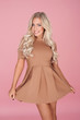 Elegant blonde woman in a miniskirt