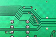 Close up of a printed green computer circuit board