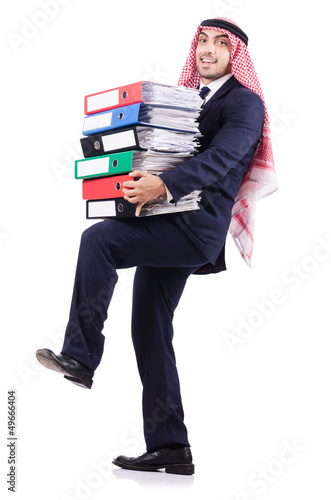 Photo: Arab businessman with many folders on white Arab businessman with many folders on white