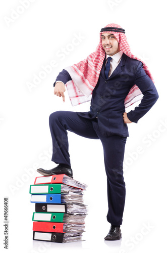 Photo: Arab businessman with many folders on white Arab businessman with many folders on white
