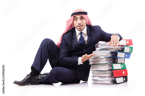 Photo: Arab businessman with many folders on white Arab businessman with many folders on white