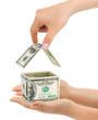 Hands and money house