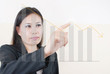 Business lady pressing down graph.