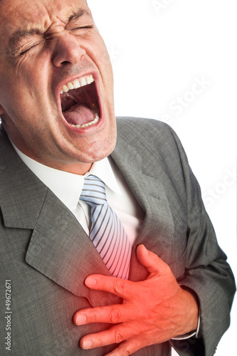 Photo: heart attack of a businessman heart attack of a businessman