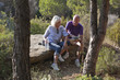Foto: senior man and woman having a break in the countryside senior man and woman having a break in the countryside