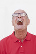 happy senior man laughing expressing his joy