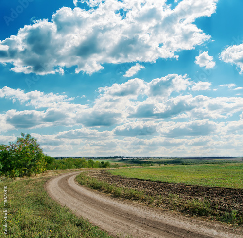 Photo: winding rural road to cloudy horizon winding rural road to cloudy horizon