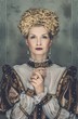 Picture of beautiful haughty queen in royal dress