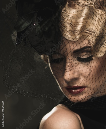 Photo: Elegant blond retro woman with red lipstick Elegant blond retro woman with red lipstick