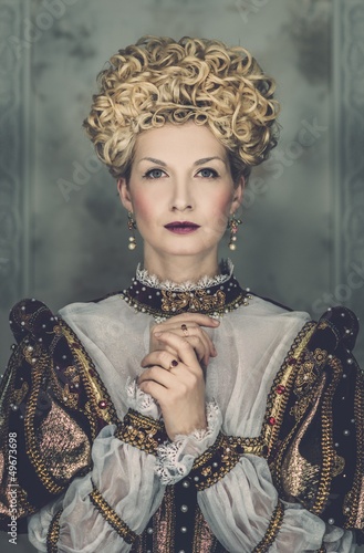 Photo: Picture of beautiful haughty queen in royal dress Picture of beautiful haughty queen in royal dress