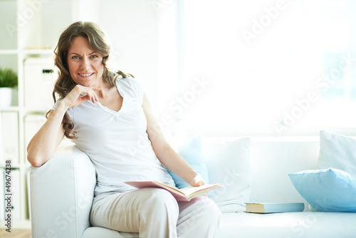 Photo: Woman on sofa Woman on sofa