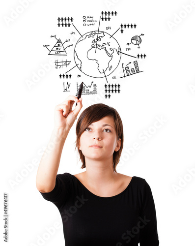 Photo: Young woman drawing globe with diagrams isolated on white Young woman drawing globe with diagrams isolated on white