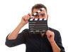 Young guy with clapper board