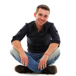 Young handsome guy sitting