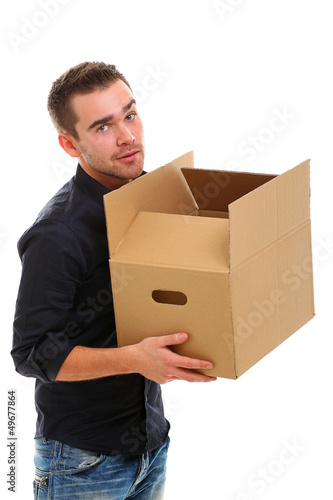 Photo: Young guy with cardboard box Young guy with cardboard box