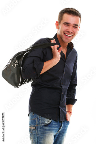 Photo: Young handsome guy with bag Young handsome guy with bag
