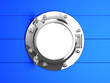 Silver porhole in blue wooden hull