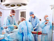 Surgeon at work in operating room.