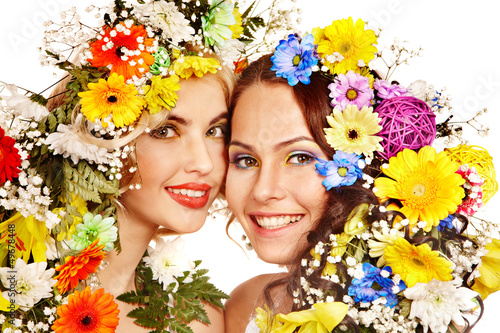 Photo: Woman with make up and flower. Woman with make up and flower.