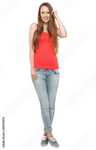 Photo: Young woman standing Young woman standing