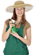 Junge Gärtnerin mit Sprühflasche